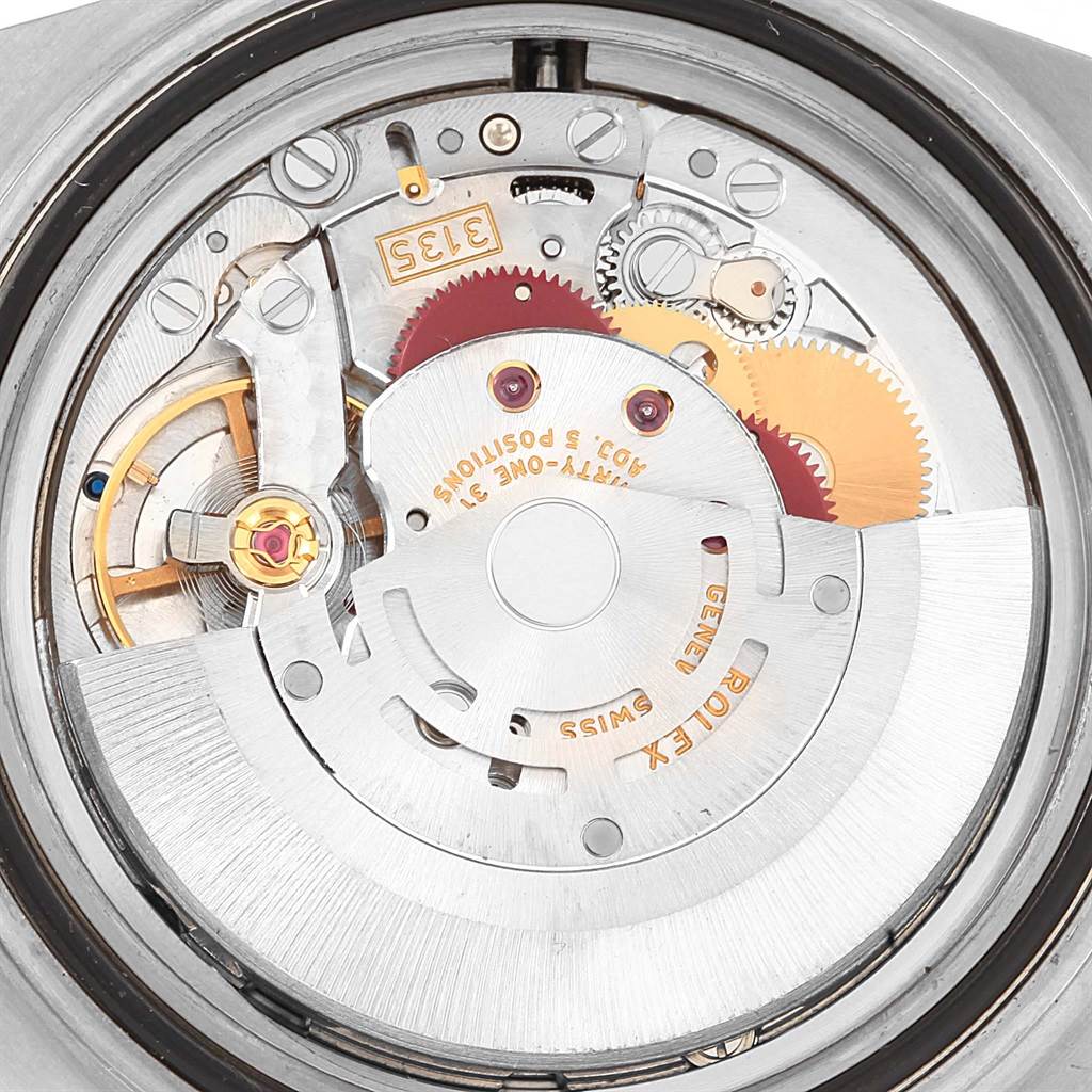 The image shows the internal mechanism of a Rolex Submariner 16613 Men's Steel and Gold (two tone) Blue Dial 16613 Men's Steel and Gold (two tone) Blue Dial watch, viewed from the back casing.