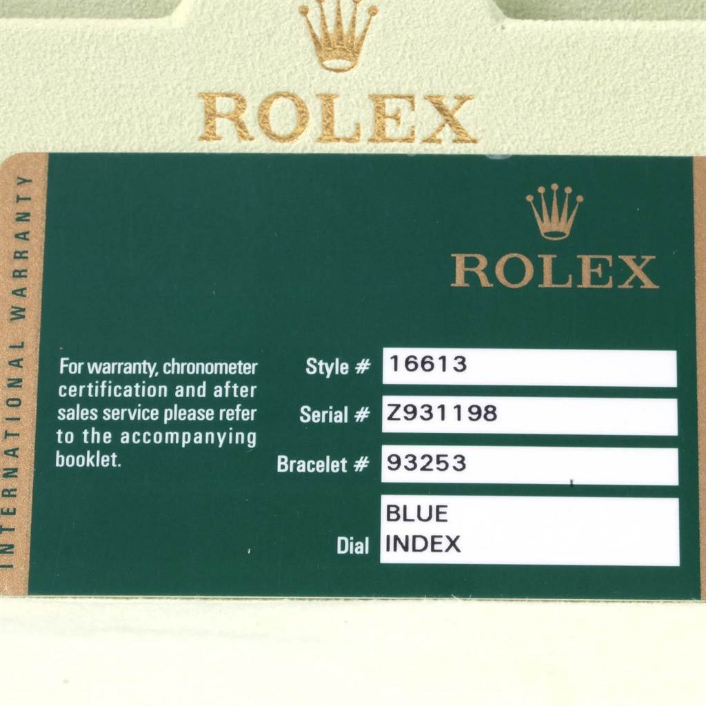 This image shows a warranty card for a Rolex Submariner 16613 Men's Steel and Gold (two tone) Blue Dial 16613 Men's Steel and Gold (two tone) Blue Dial, detailing the style number, serial number, bracelet number, and dial information.