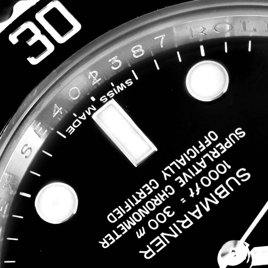 The image shows a close-up of the dial and bezel of a Rolex Submariner 116610 Men's Stainless Steel Black Dial 116610 Men's Stainless Steel Black Dial watch, highlighting the Swiss Made inscription and depth rating.