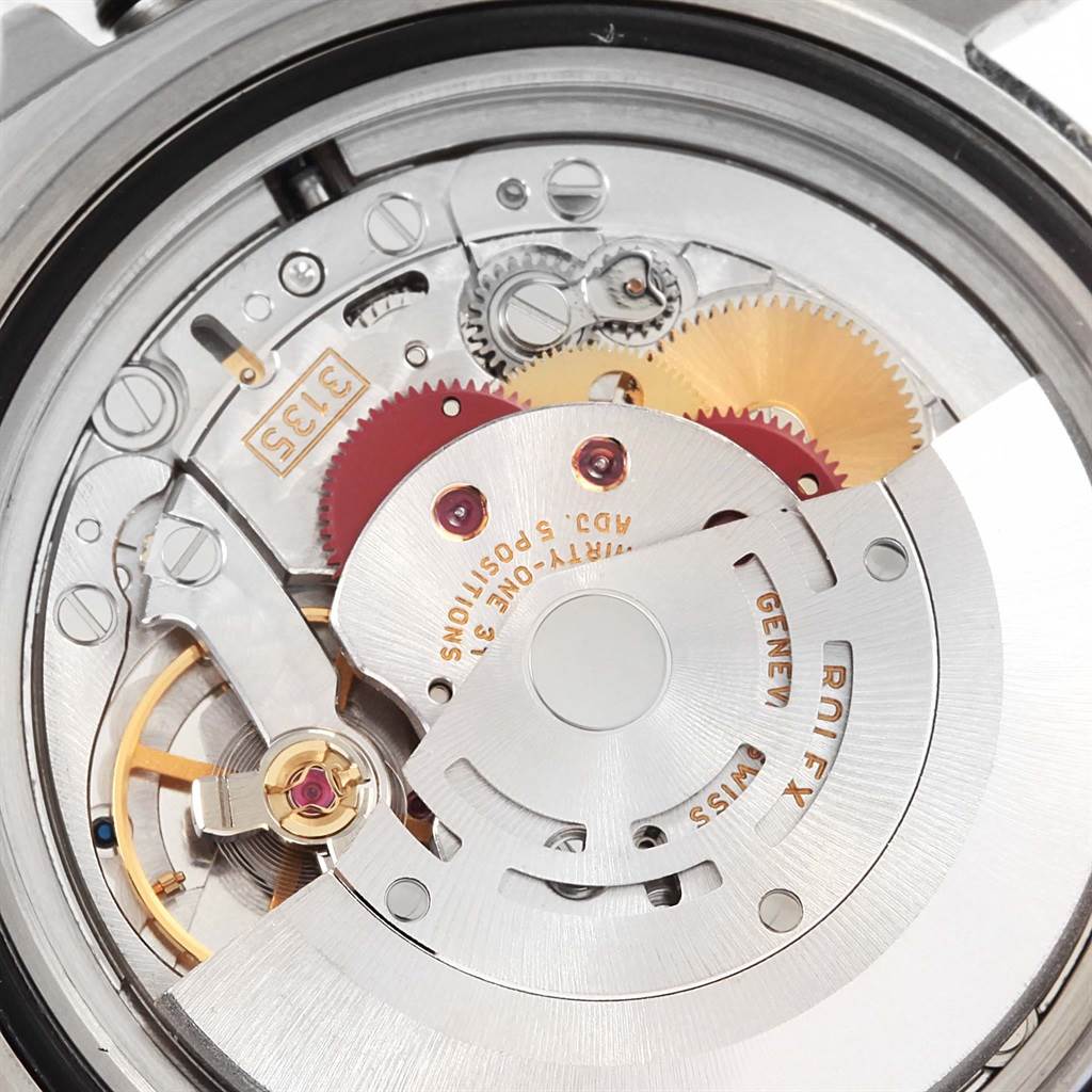 The image shows the internal movement and mechanism parts of a Rolex Submariner 16613 Men's Steel and Gold (two tone) Champagne Dial 16613 Men's Steel and Gold (two tone) Champagne Dial watch from a close-up angle.