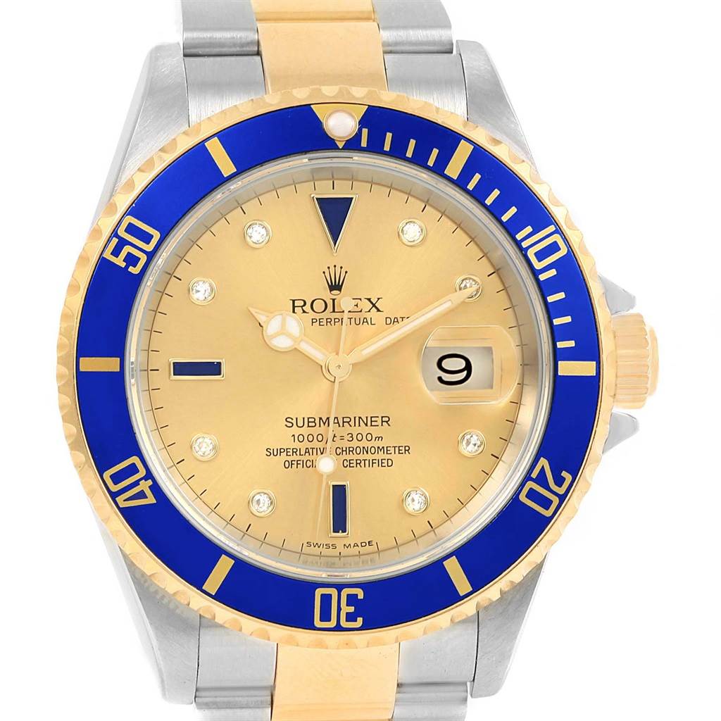 This is a top-down view of a Rolex Submariner 16613 Men's Steel and Gold (two tone) Champagne Dial 16613 Men's Steel and Gold (two tone) Champagne Dial watch, showcasing the face, bezel, and part of the bracelet.