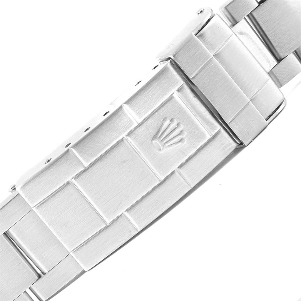 The image shows a close-up view of the clasp and part of the bracelet of a Rolex Submariner 16610 Men's Stainless Steel Black Dial 16610 Men's Stainless Steel Black Dial watch.