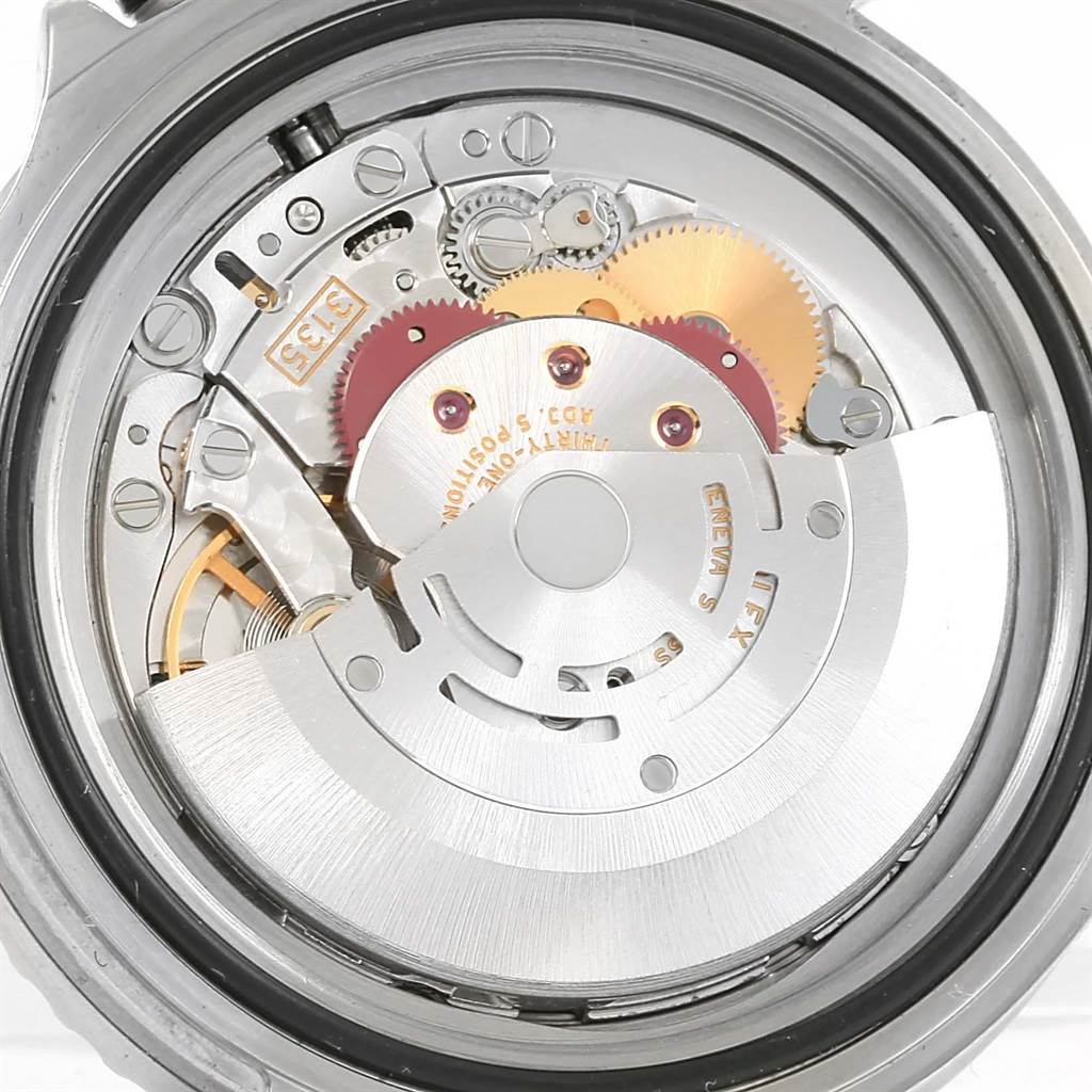 The image shows the movement mechanism of a Rolex Submariner 16610 Men's Stainless Steel Black Dial 16610 Men's Stainless Steel Black Dial watch from a back view.