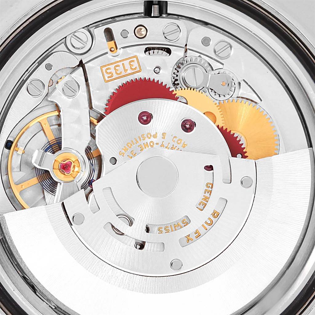 The image shows the internal mechanical parts of a Rolex Submariner 116610 Men's Stainless Steel Black Dial 116610 Men's Stainless Steel Black Dial watch from a top-down angle.