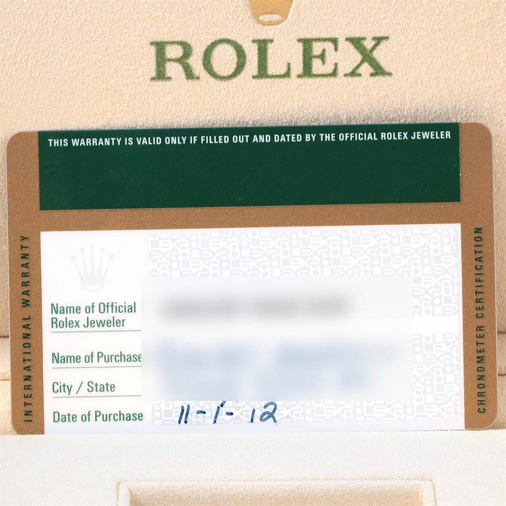 This image shows a close-up of the warranty card for the Rolex Submariner 116610 Men's Stainless Steel Black Dial 116610 Men's Stainless Steel Black Dial watch.