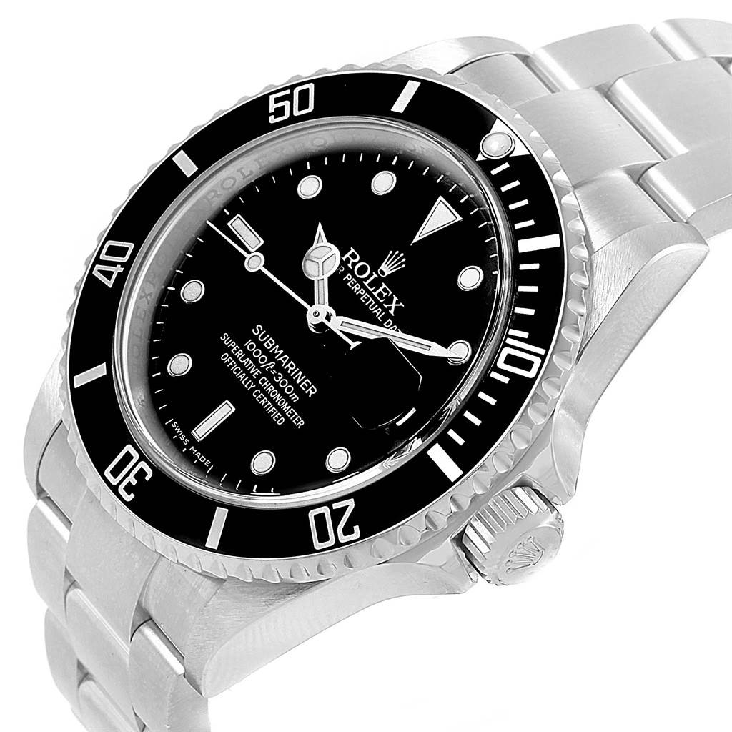 The image shows a Rolex Submariner 16610 Men's Stainless Steel Black Dial 16610 Men's Stainless Steel Black Dial watch at a tilted angle, highlighting the dial, bezel, crown, and a portion of the bracelet.