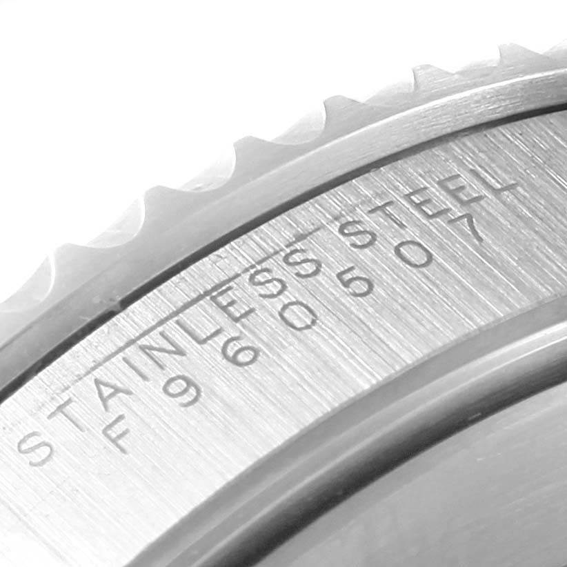 The image shows a close-up of the edge and side of the stainless steel casing for the Rolex Submariner 14060 Men's Stainless Steel Black Dial 14060 Men's Stainless Steel Black Dial model watch.
