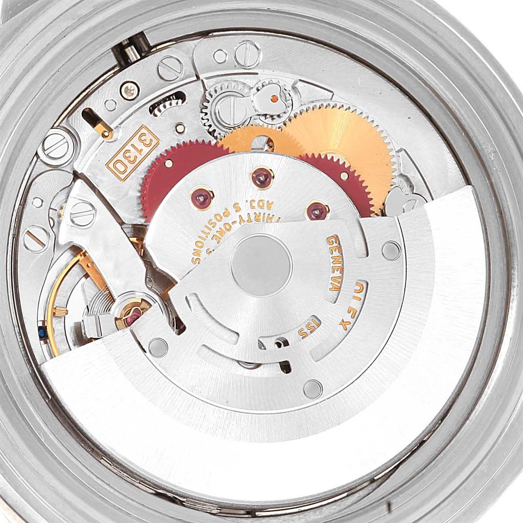 This image shows a close-up view of the mechanical movement inside a Rolex Submariner 14060 Men's Stainless Steel Black Dial 14060 Men's Stainless Steel Black Dial watch.