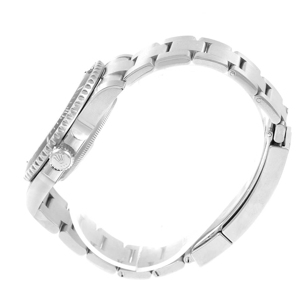 This image shows a side view of the crown, bezel, case, and bracelet of a Rolex Submariner 114060 Men's Stainless Steel Black Dial 114060 Men's Stainless Steel Black Dial watch.