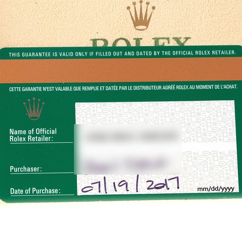 This image shows the guarantee card of a Rolex Submariner 114060 Men's Stainless Steel Black Dial 114060 Men's Stainless Steel Black Dial, including the purchase date and official retailer information.