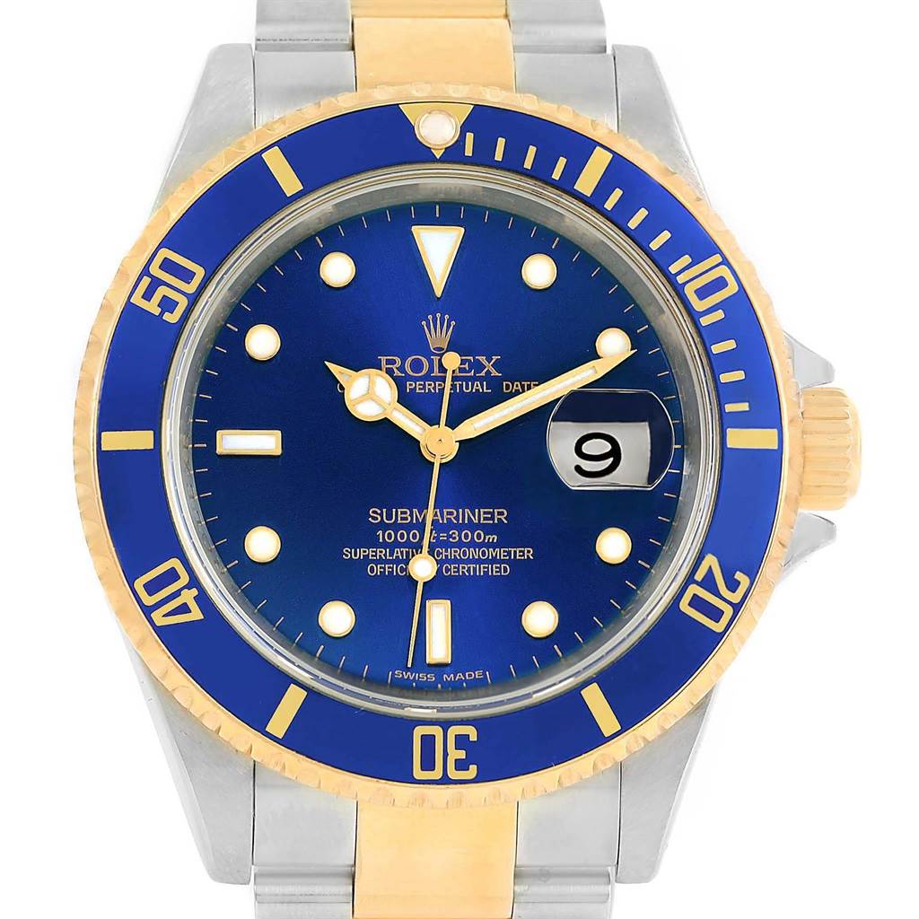 This image shows the face and bezel of a Rolex Submariner 16613 Men's Steel and Gold (two tone) Blue Dial 16613 Men's Steel and Gold (two tone) Blue Dial watch at a straight-on angle.