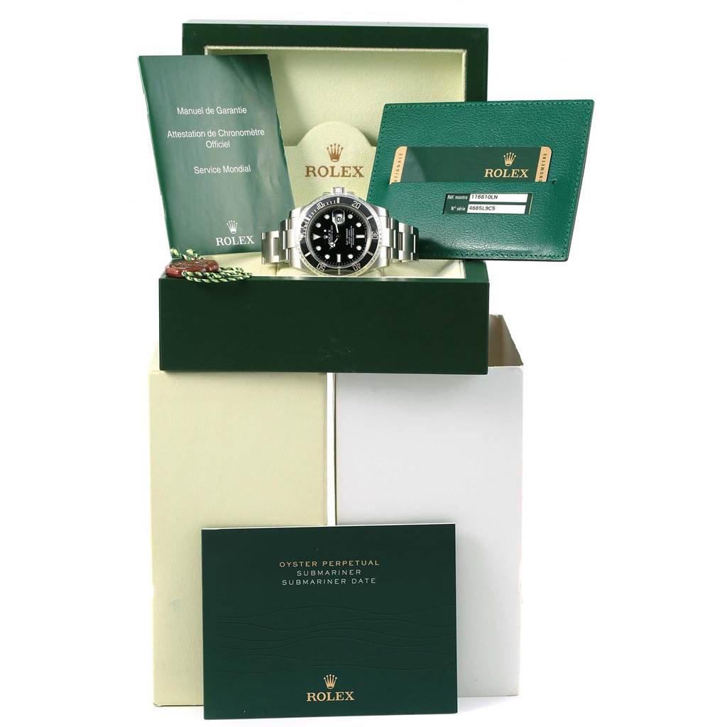 This image shows a Rolex Submariner 116610 Men's Stainless Steel Black Dial 116610 Men's Stainless Steel Black Dial watch laid out with its box, manuals, and warranty card viewable from a front angle.