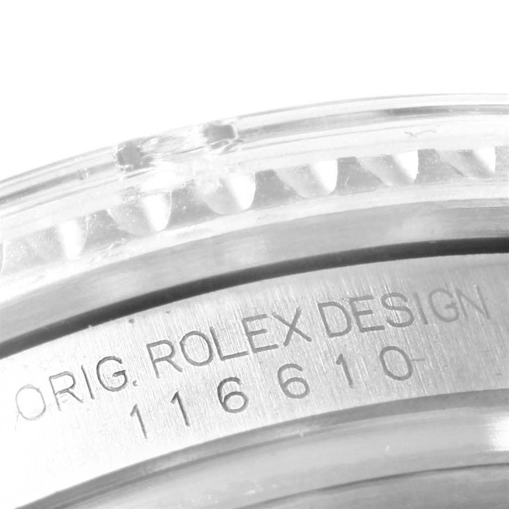 This close-up image shows the engraved bezel and case of a Rolex Submariner 116610 Men's Stainless Steel Black Dial 116610 Men's Stainless Steel Black Dial, highlighting the model number 116610.