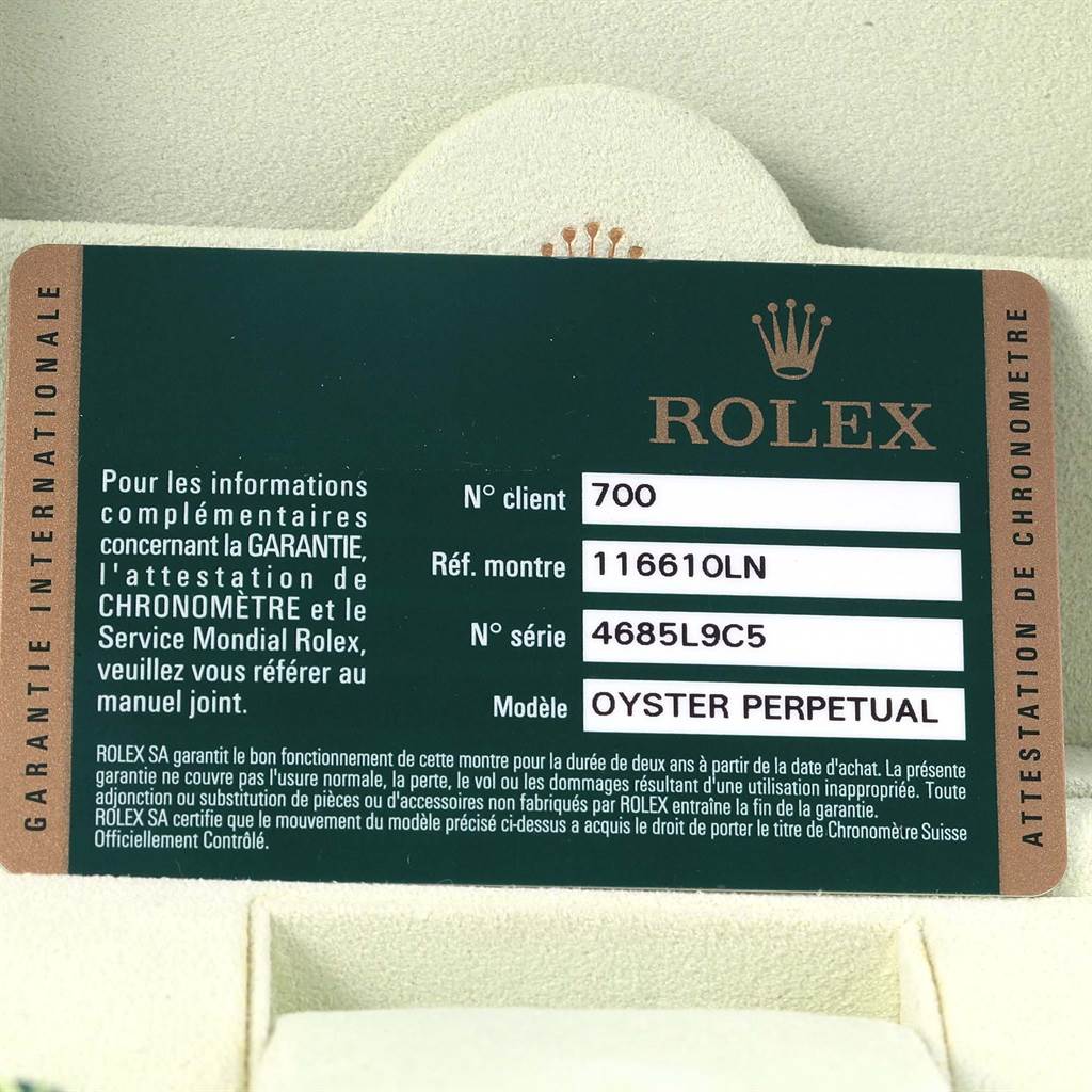 The image shows a Rolex Submariner 116610 Men's Stainless Steel Black Dial 116610 Men's Stainless Steel Black Dial model's warranty card with details such as reference number, serial number, and model name.