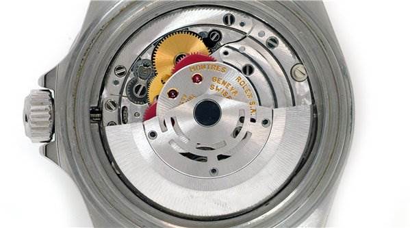 This image shows the internal mechanical parts of a Rolex Submariner 16610 Men's Stainless Steel Black Dial 16610 Men's Stainless Steel Black Dial watch viewed from the back.