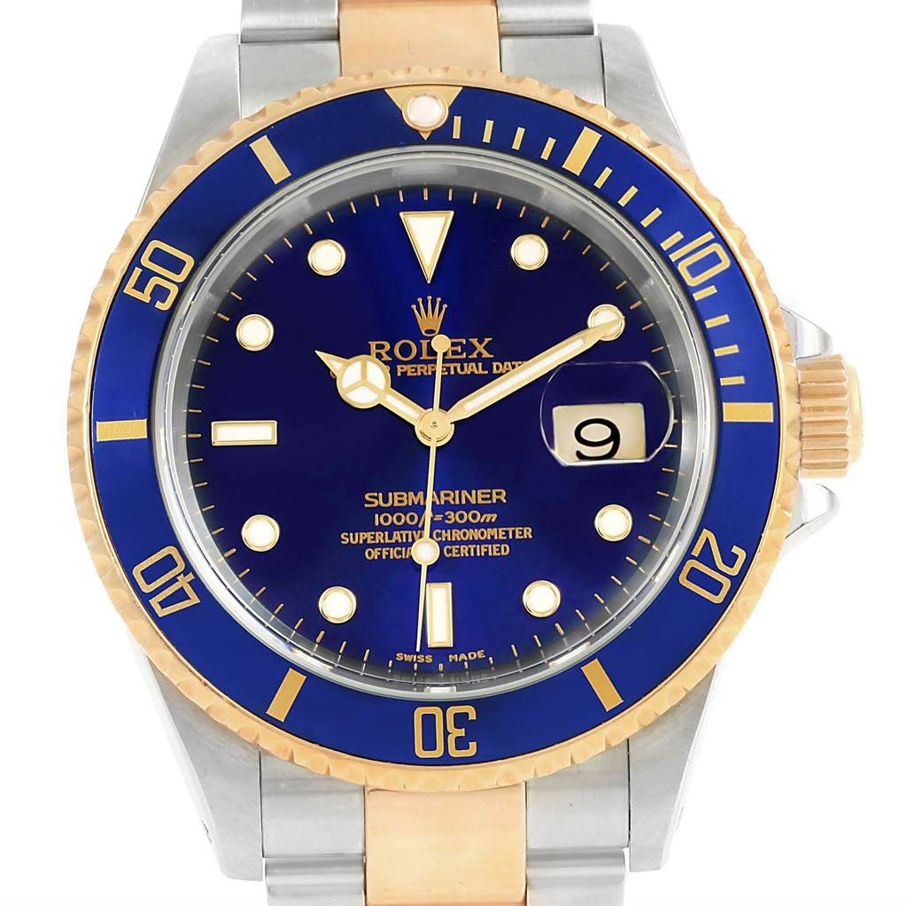 The Rolex Submariner 16613 Men's Steel and Gold (two tone) Blue Dial 16613 Men's Steel and Gold (two tone) Blue Dial watch is shown from the front, displaying the dial, hands, date window, bezel, and part of the bracelet.
