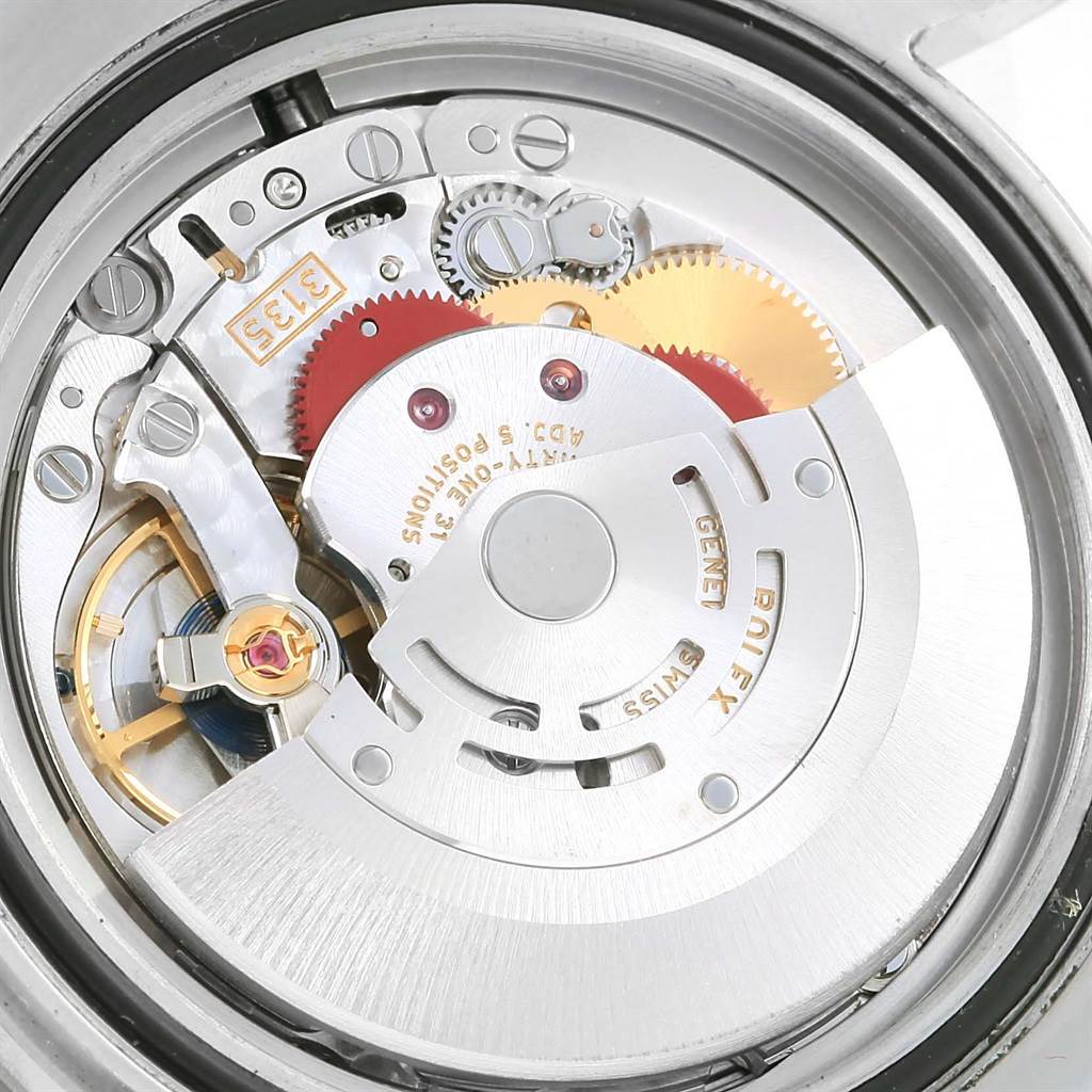This image shows a close-up of the movement mechanism inside a Rolex Submariner 116610 Men's Stainless Steel Black Dial 116610 Men's Stainless Steel Black Dial watch.