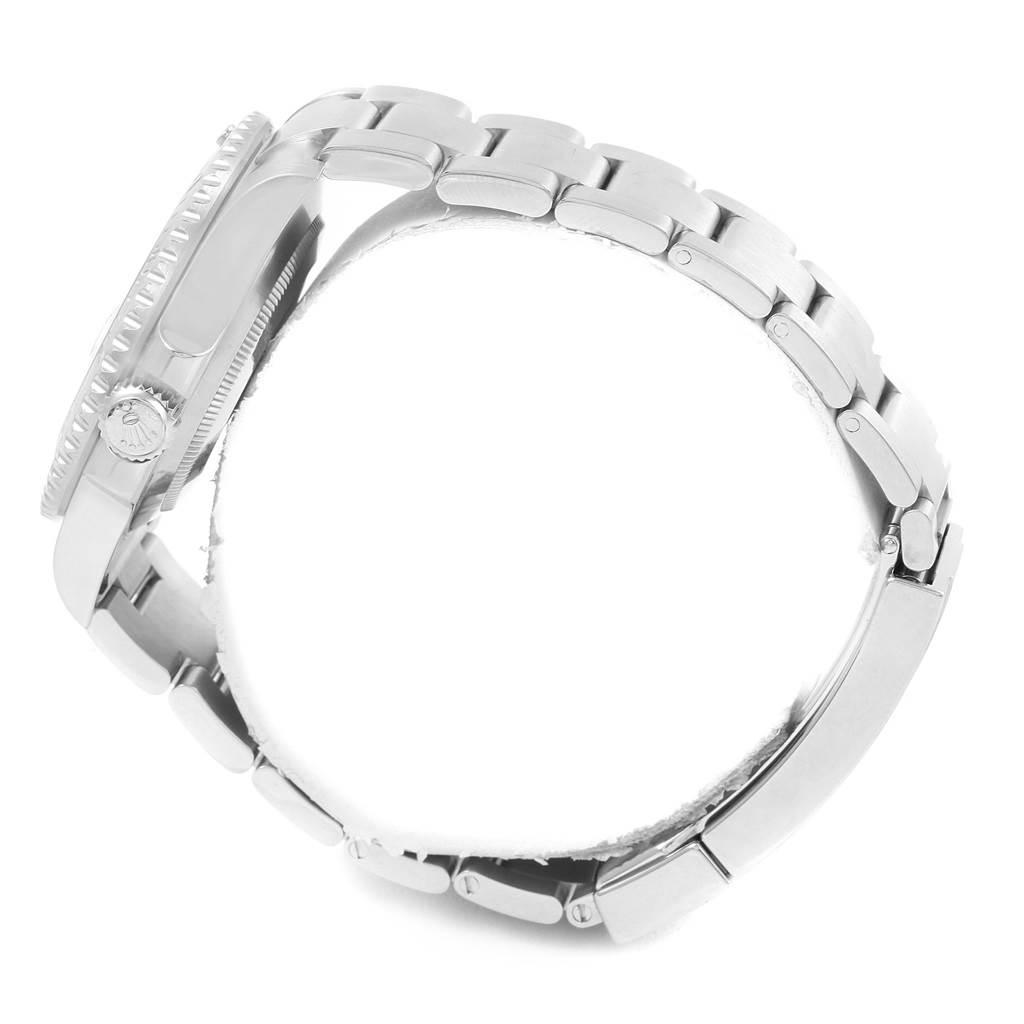 This side view of the Rolex Submariner 116610 Men's Stainless Steel Black Dial 116610 Men's Stainless Steel Black Dial shows the watch case, bezel, crown, and bracelet.