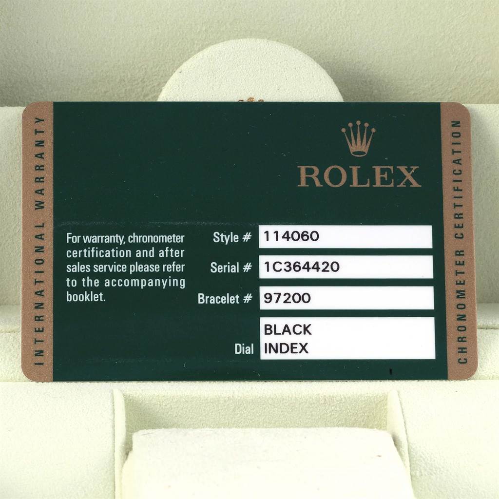 The image shows a warranty card for a Rolex Submariner 114060 Men's Stainless Steel Black Dial 114060 Men's Stainless Steel Black Dial model watch, including style, serial, and bracelet numbers.