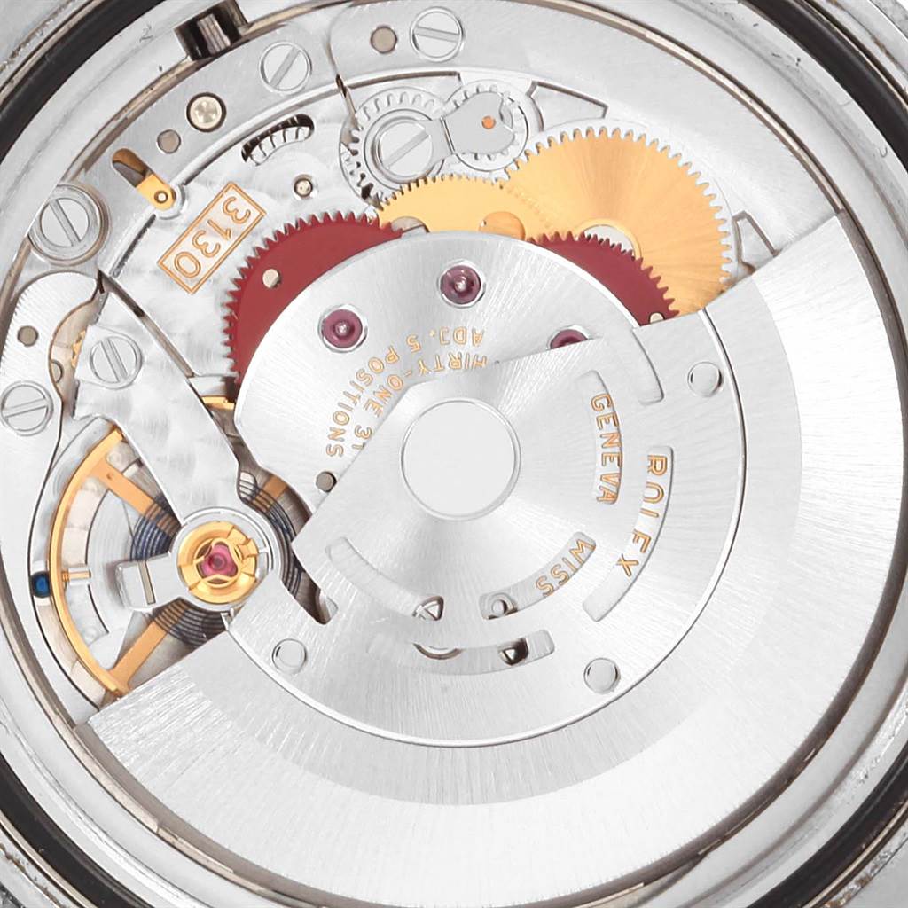 This is a close-up view of the internal mechanics of the Rolex Submariner 114060 Men's Stainless Steel Black Dial 114060 Men's Stainless Steel Black Dial watch, showing gears and the automatic movement components.