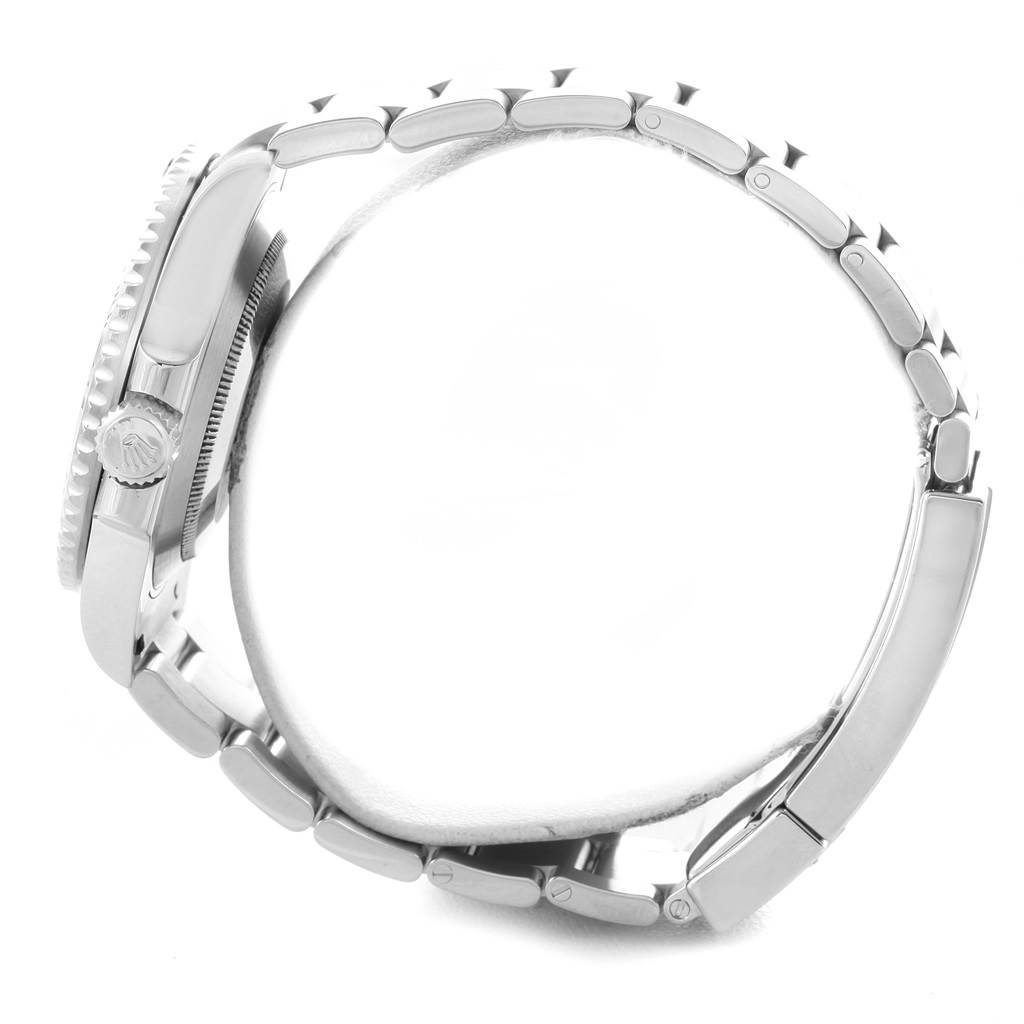 The image shows a side view of a Rolex Submariner 114060 Men's Stainless Steel Black Dial 114060 Men's Stainless Steel Black Dial watch, specifically displaying its crown, case, and bracelet.