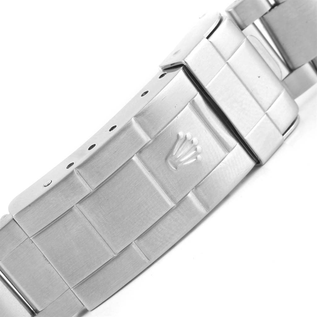 This image shows a close-up of the metal bracelet and clasp of a Rolex Submariner 16610 Men's Stainless Steel Black Dial 16610 Men's Stainless Steel Black Dial watch.