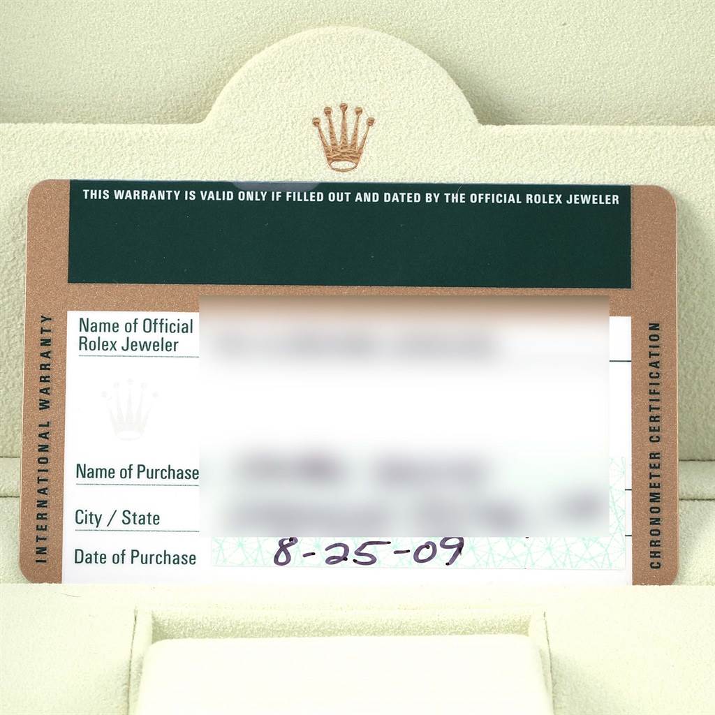 This image shows the international warranty card for a Rolex Submariner 16613 Men's Steel and Gold (two tone) Grey Dial 16613 Men's Steel and Gold (two tone) Grey Dial watch.