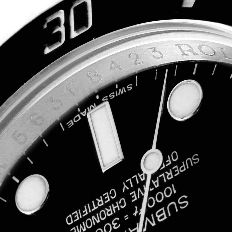 The image shows a close-up of the dial, bezel, and text on the Rolex Submariner 116610 Men's Stainless Steel Black Dial 116610 Men's Stainless Steel Black Dial watch.
