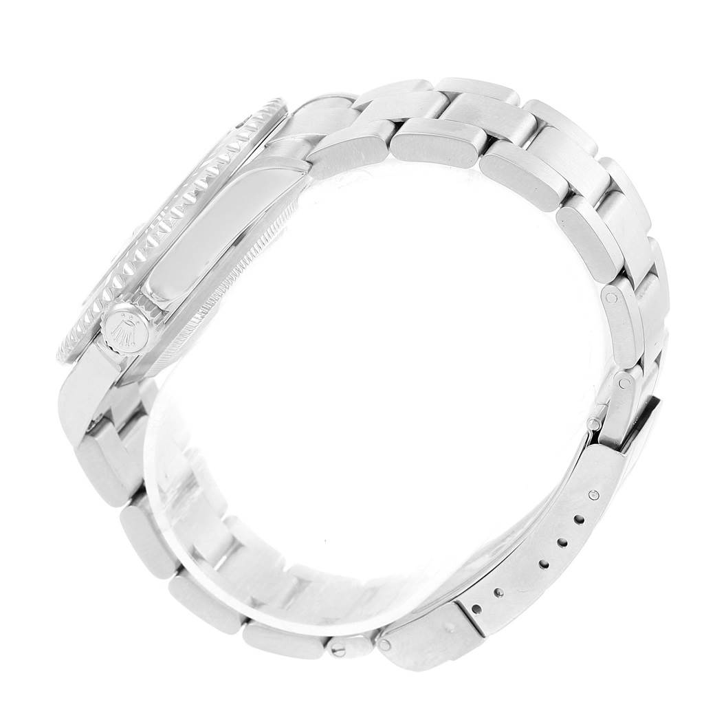 The image shows a side view of a Rolex Submariner 16610 Men's Stainless Steel Black Dial 16610 Men's Stainless Steel Black Dial watch, highlighting the case, bracelet, crown, and clasp.