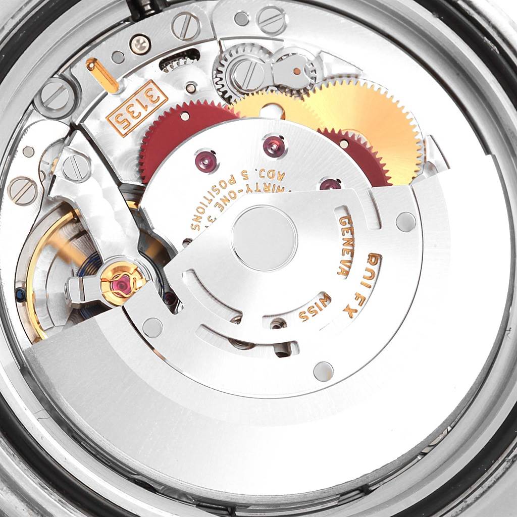 The image shows an angled view of the movement and internal mechanisms of a Rolex Submariner 116610 Men's Stainless Steel Black Dial 116610 Men's Stainless Steel Black Dial watch.