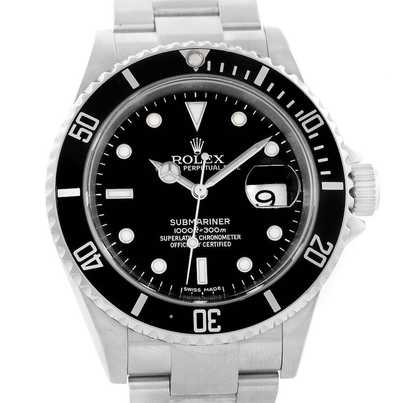 The image shows a front view of a Rolex Submariner watch, highlighting its black dial, bezel, and stainless steel bracelet.