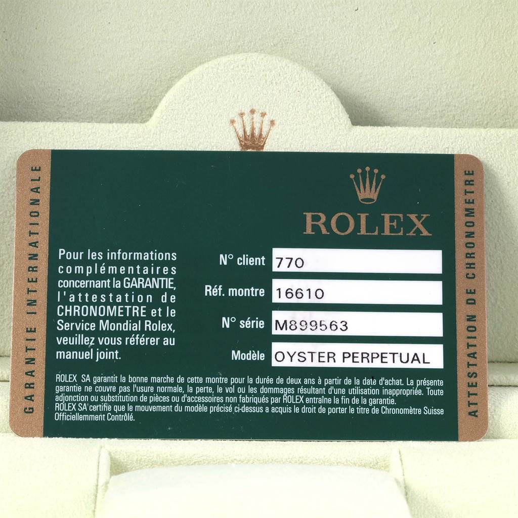 The image shows a warranty card for the Rolex Submariner 16610 Men's Stainless Steel Black Dial 16610 Men's Stainless Steel Black Dial, detailing client number, reference number, and serial number.