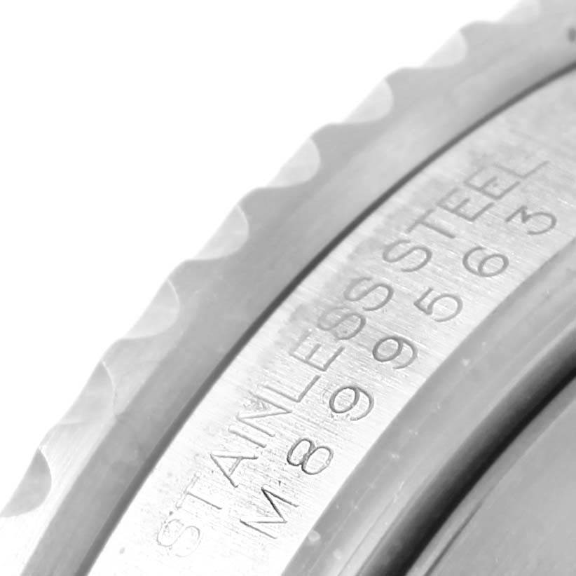 The image shows a close-up of the engraved stainless steel case back of a Rolex Submariner 16610 Men's Stainless Steel Black Dial 16610 Men's Stainless Steel Black Dial watch.