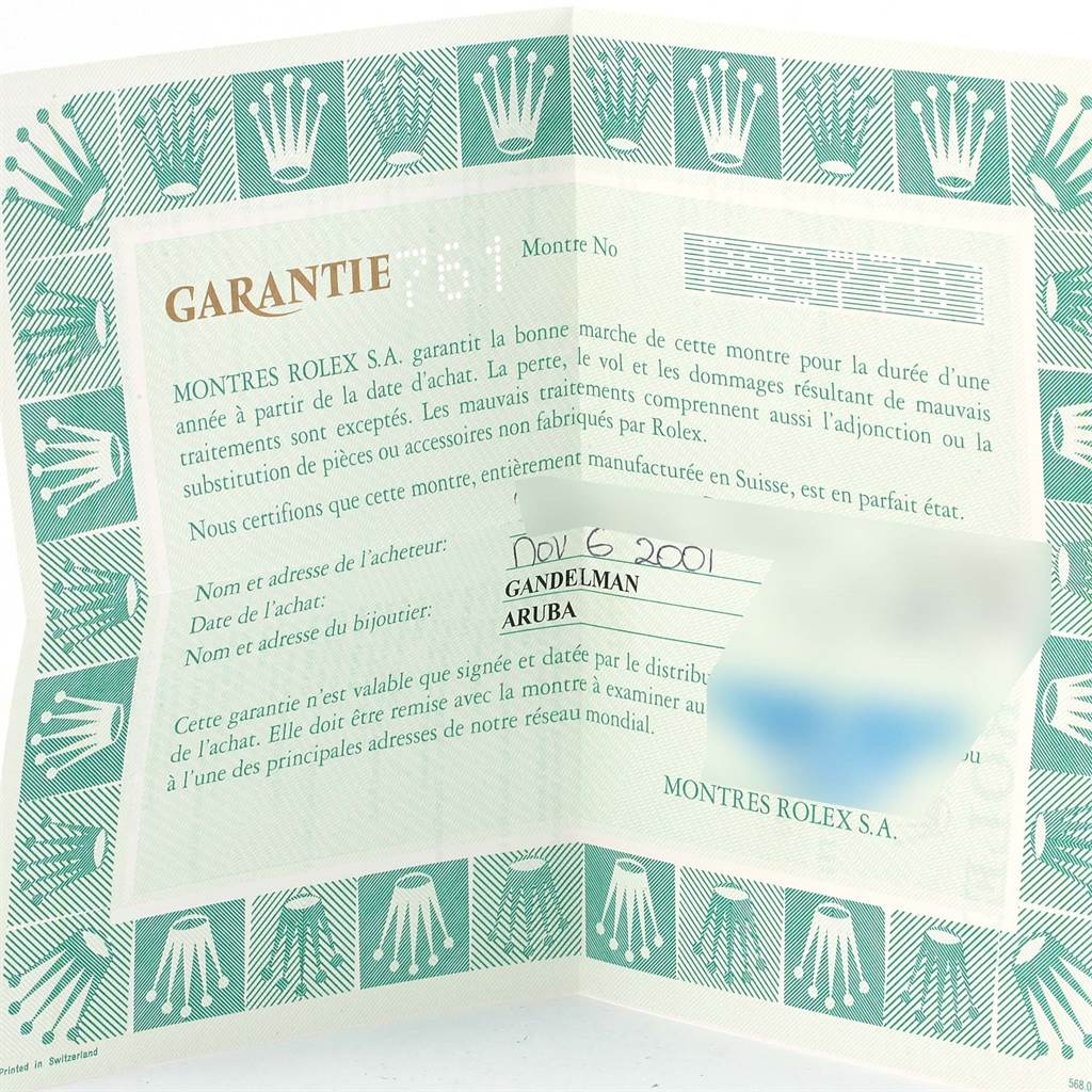 This image shows a warranty certificate for a Rolex Submariner 14060 Men's Stainless Steel Black Dial 14060 Men's Stainless Steel Black Dial watch.