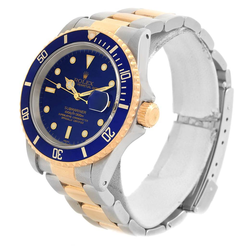 This image shows a Rolex Submariner 16613 Men's Steel and Gold (two tone) Blue Dial 16613 Men's Steel and Gold (two tone) Blue Dial watch at a three-quarter angle, highlighting the bezel, dial, and bracelet.