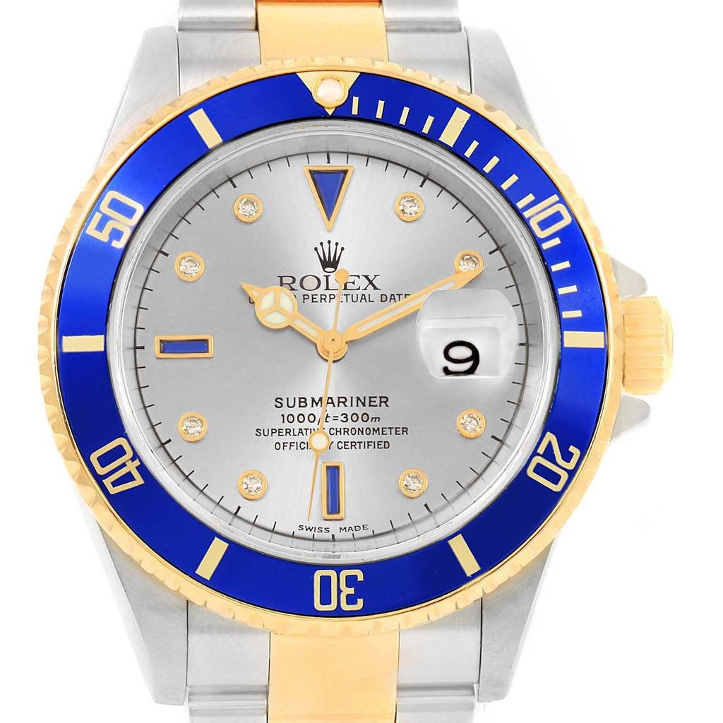 This is a front view of a Rolex Submariner 16613 Men's Steel and Gold (two tone) Grey Dial 16613 Men's Steel and Gold (two tone) Grey Dial watch, showcasing the dial, bezel, and part of the bracelet.