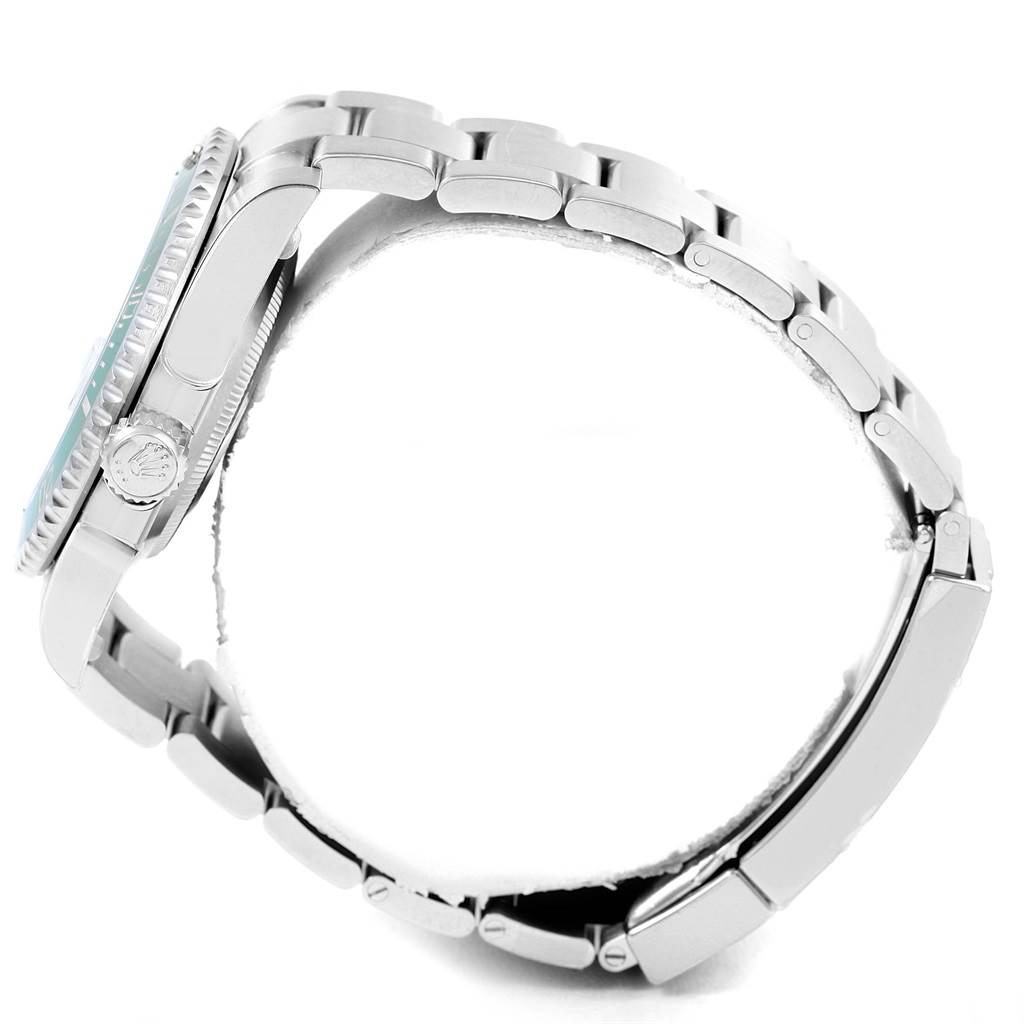 The image shows a side view of the Rolex Submariner 116610LV Men
s Stainless Steel Green Dial 116610LV Men
s Stainless Steel Green Dial watch, highlighting its crown, bezel, and metal bracelet.