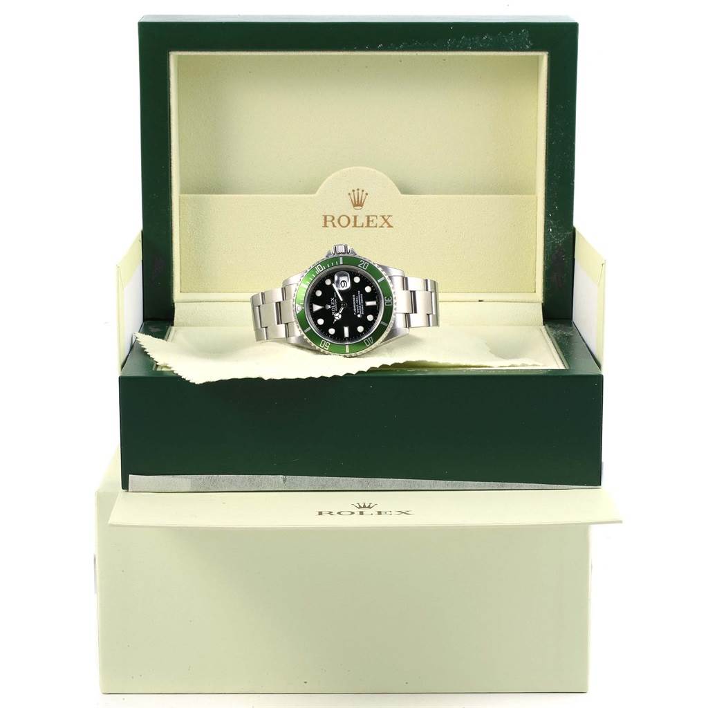 The image shows the Rolex Submariner 16610LV Men's Stainless Steel Black Dial 16610LV Men's Stainless Steel Black Dial watch in its green and beige box, displayed at an angle facing forward.