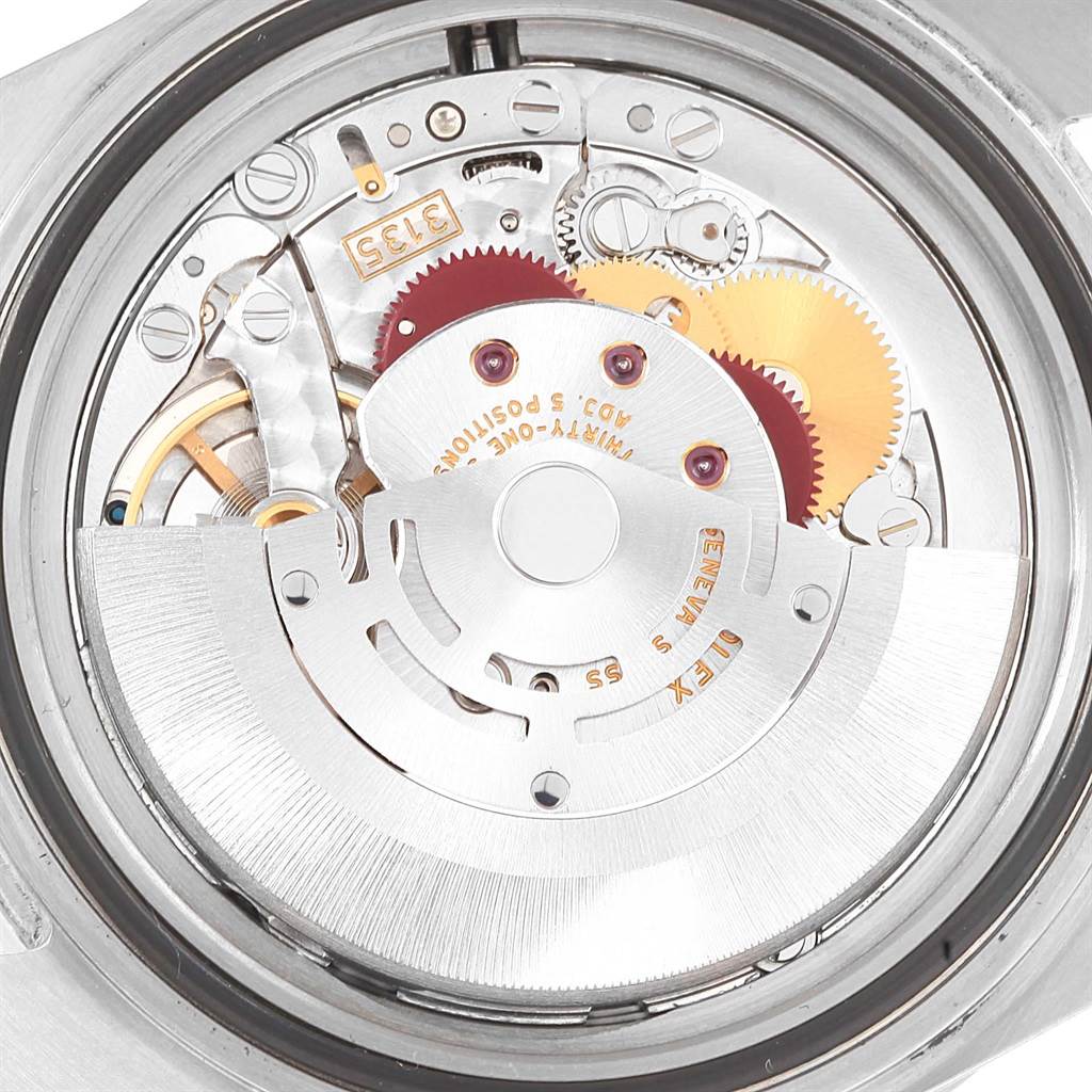 This image shows the internal mechanism of a Rolex Submariner 16610LV Men's Stainless Steel Black Dial 16610LV Men's Stainless Steel Black Dial watch, viewed from the back.