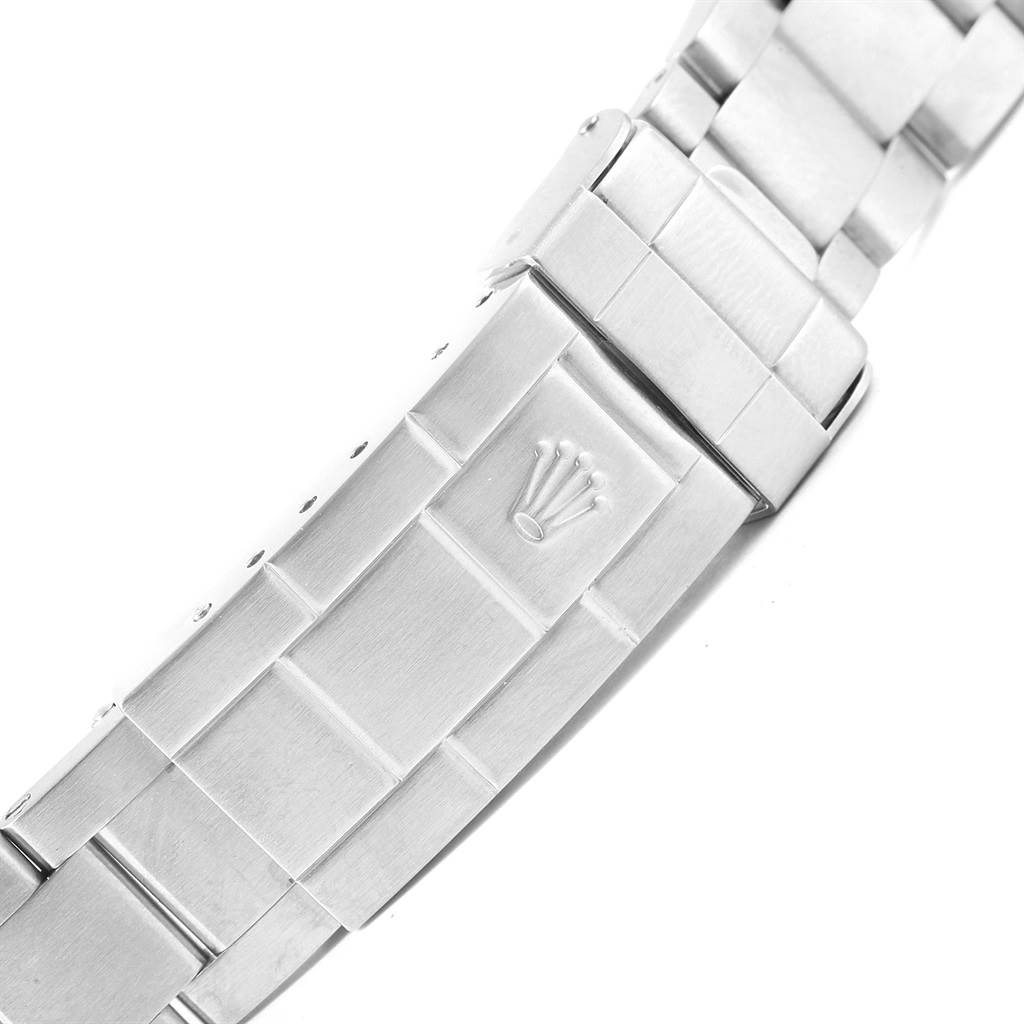 This image shows a close-up of the clasp and bracelet of a Rolex Submariner 16610 Men's Stainless Steel Black Dial 16610 Men's Stainless Steel Black Dial watch.