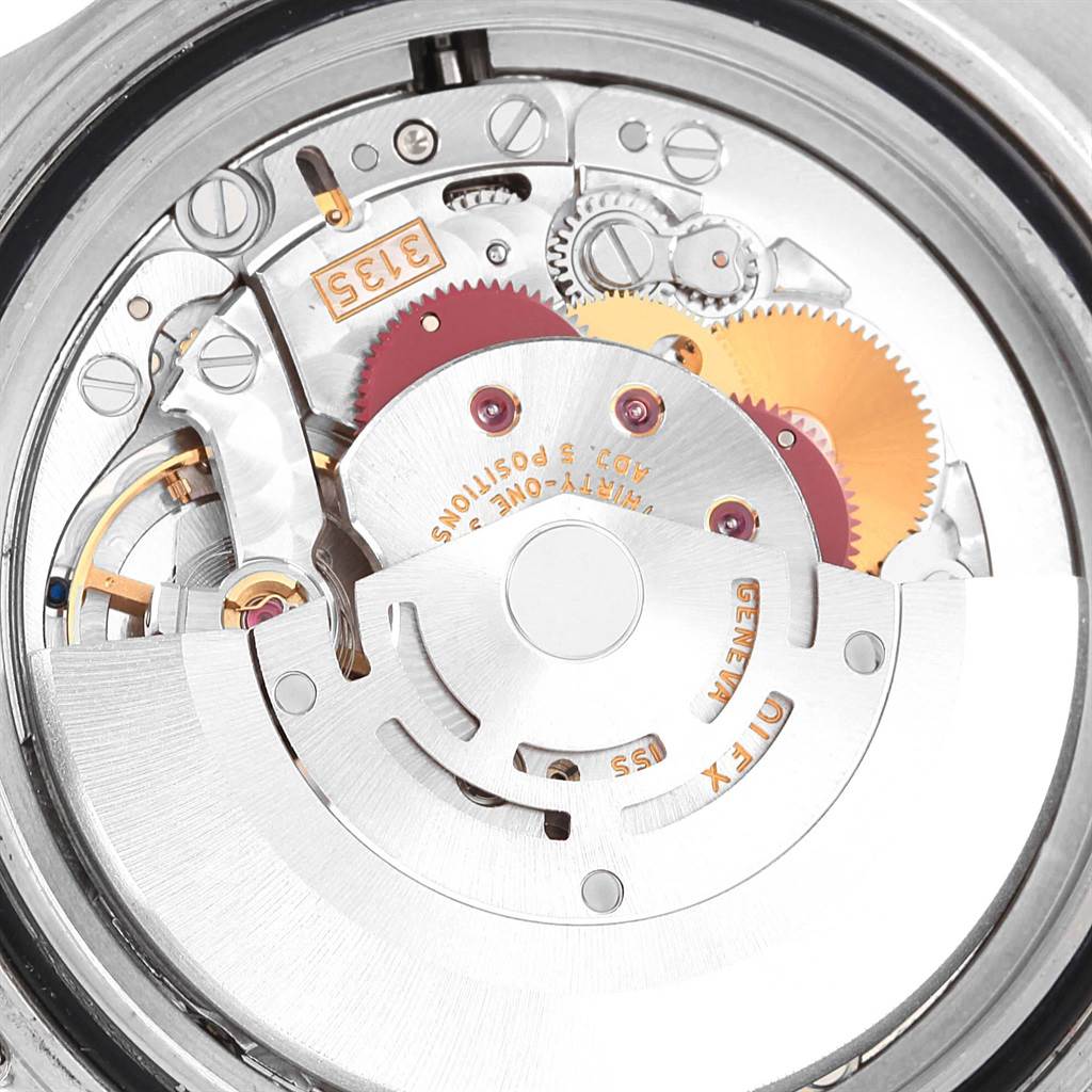 The image shows the internal mechanical movement of a Rolex Submariner 16610 Men's Stainless Steel Black Dial 16610 Men's Stainless Steel Black Dial watch from a top-down angle.