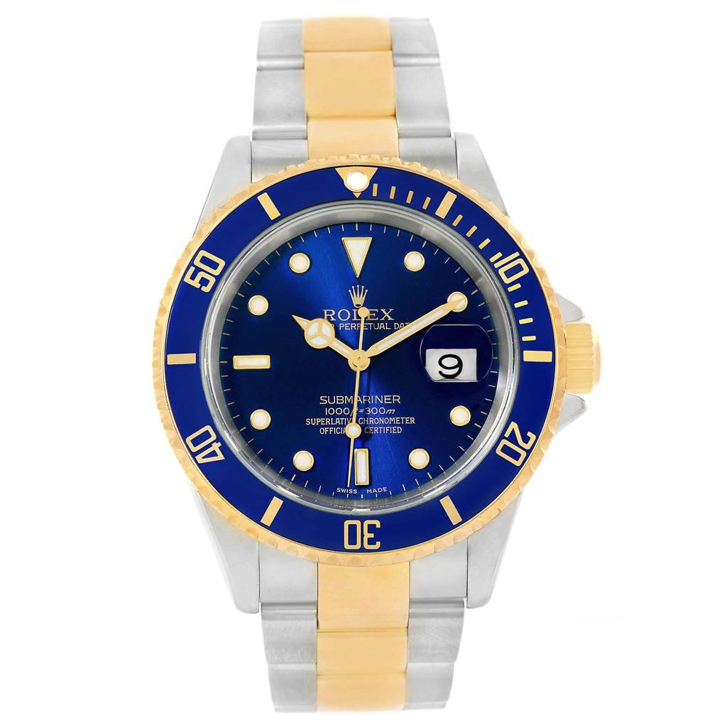 The image shows a Rolex Submariner 16613 Men's Steel and Gold (two tone) Blue Dial 16613 Men's Steel and Gold (two tone) Blue Dial watch from a front angle, displaying its blue and gold dial, bezel, and two-tone bracelet.
