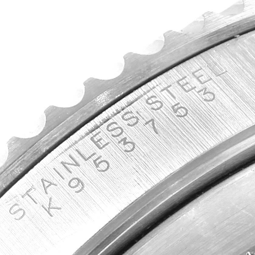 The image shows a close-up of the stainless steel bezel and edge of the dial on a Rolex Submariner 14060 Men's Stainless Steel Black Dial 14060 Men's Stainless Steel Black Dial watch.