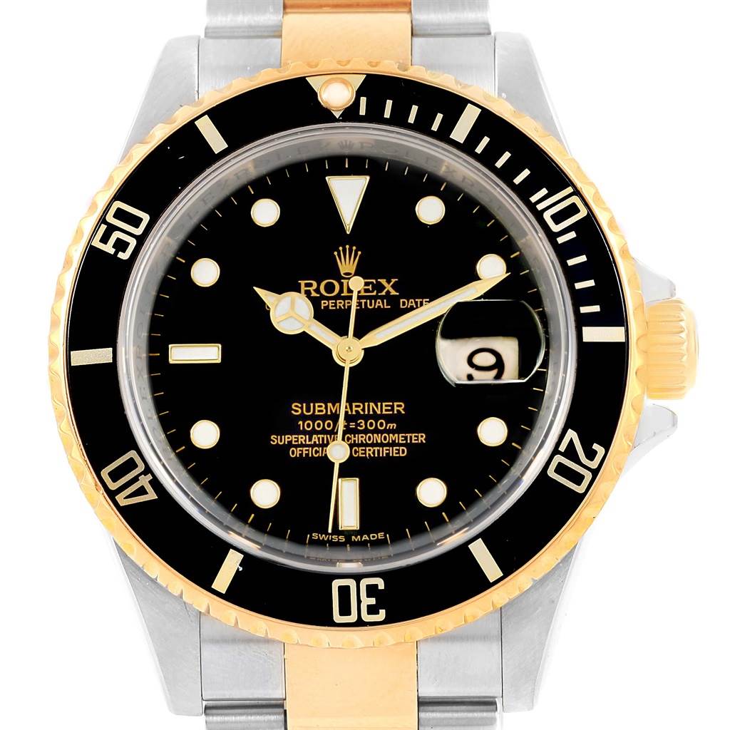 This image shows a Rolex Submariner 16613 Men's Steel and Gold (two tone) Black Dial 16613 Men's Steel and Gold (two tone) Black Dial watch from the front, highlighting the black dial, gold bezel, and two-tone bracelet.