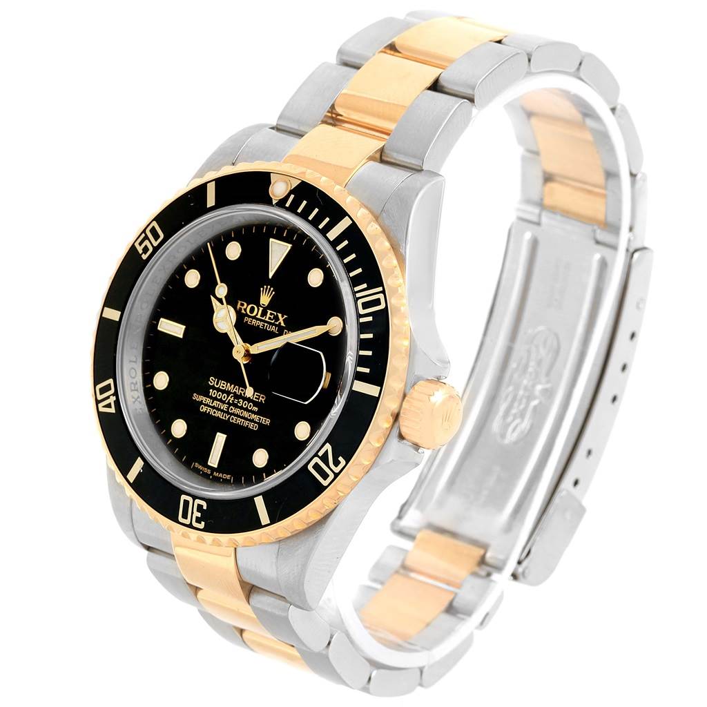 The Rolex Submariner 16613 Men's Steel and Gold (two tone) Black Dial 16613 Men's Steel and Gold (two tone) Black Dial watch is shown at an angled side view, displaying its dial, bezel, crown, and bi-tone bracelet.