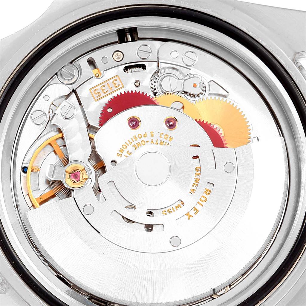 The image shows a detailed view of the movement components of a Rolex Submariner 16610LV Men's Stainless Steel Black Dial 16610LV Men's Stainless Steel Black Dial watch from the back.