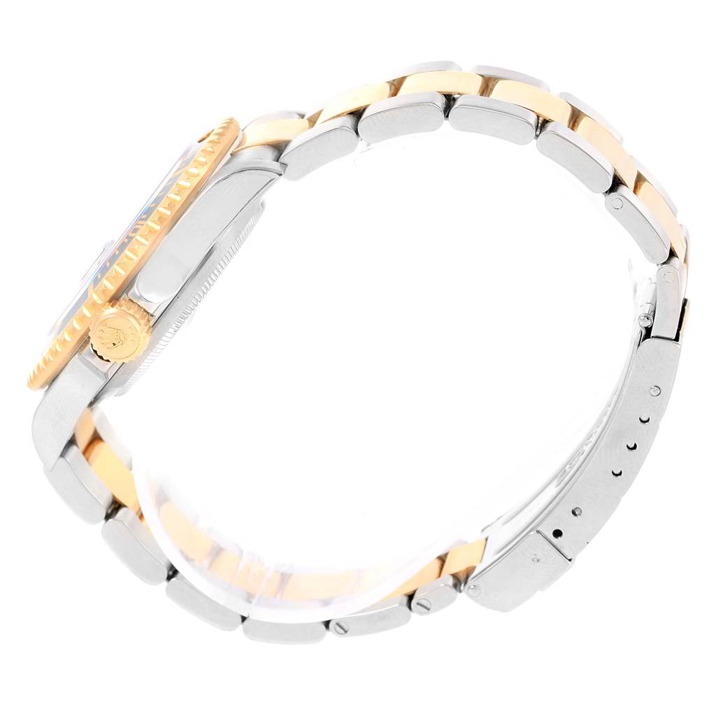 The image shows a side view of the Rolex Submariner 16613 Men's Steel and Gold (two tone) Black Dial 16613 Men's Steel and Gold (two tone) Black Dial watch, highlighting its two-tone bracelet, crown, and bezel.