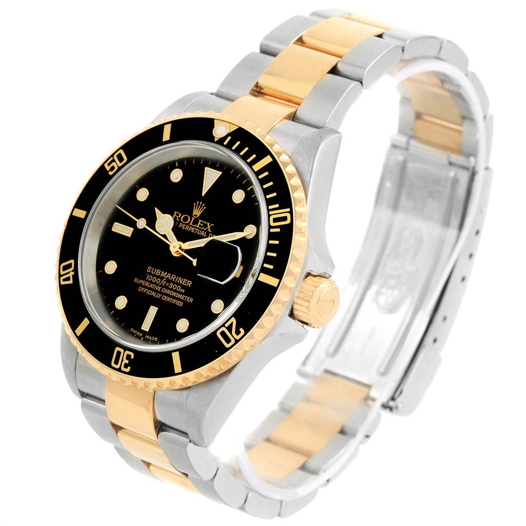 The Rolex Submariner 16613 Men's Steel and Gold (two tone) Black Dial 16613 Men's Steel and Gold (two tone) Black Dial watch is shown in an angled view displaying its bezel, dial, crown, and bi-metal bracelet.