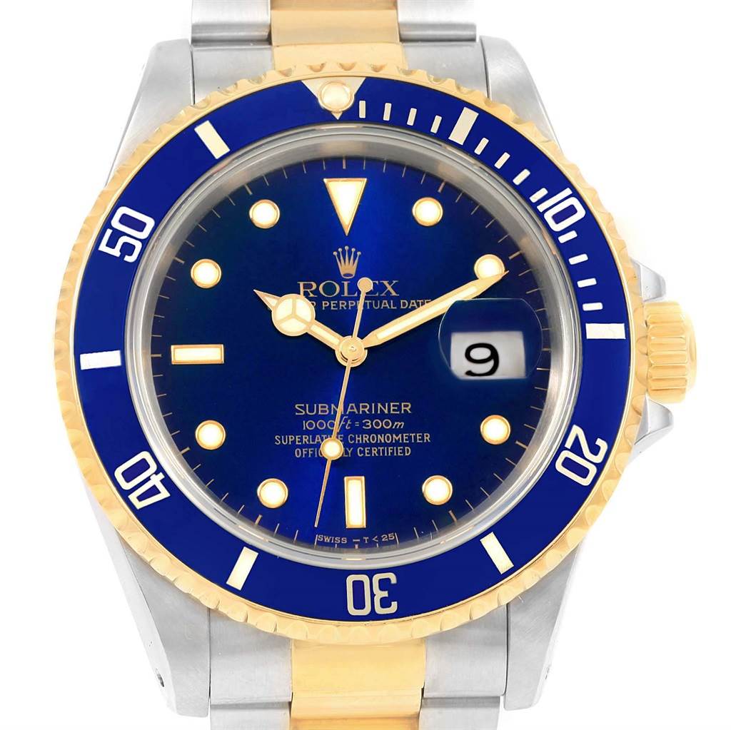 This image shows the Rolex Submariner 16613 Men's Steel and Gold (two tone) Blue Dial 16613 Men's Steel and Gold (two tone) Blue Dial watch from a front angle, highlighting its blue dial, bezel, and part of its two-tone bracelet.