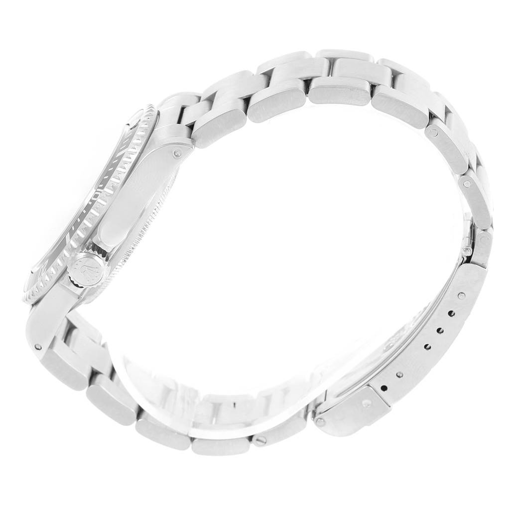 The image shows a side view of a Rolex Submariner 14060 Men's Stainless Steel Black Dial 14060 Men's Stainless Steel Black Dial watch, highlighting the bracelet, case, and crown.